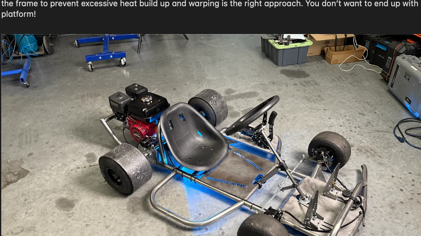 Unpainted Dad Drift Kart assembled with engine, seat, steering and wheels